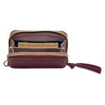 Plum pebble leather Consuela wallet with card slots inside and out, zip closure, D-ring, accordion-style design and three exterior card slots
