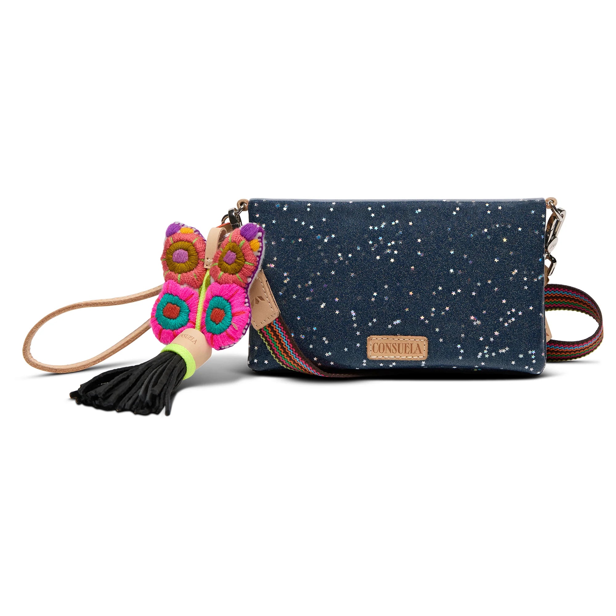 Cosmic blue chambray glitter Consuela wallet with three zippered pockets, six card slots, an ID window with a wristlet strap or an adjustable woven crossbody strap