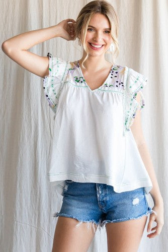White Ruffle Top with Abstract Print Detail