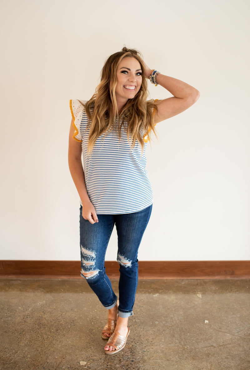 High Rise Skinny w/ Distressing