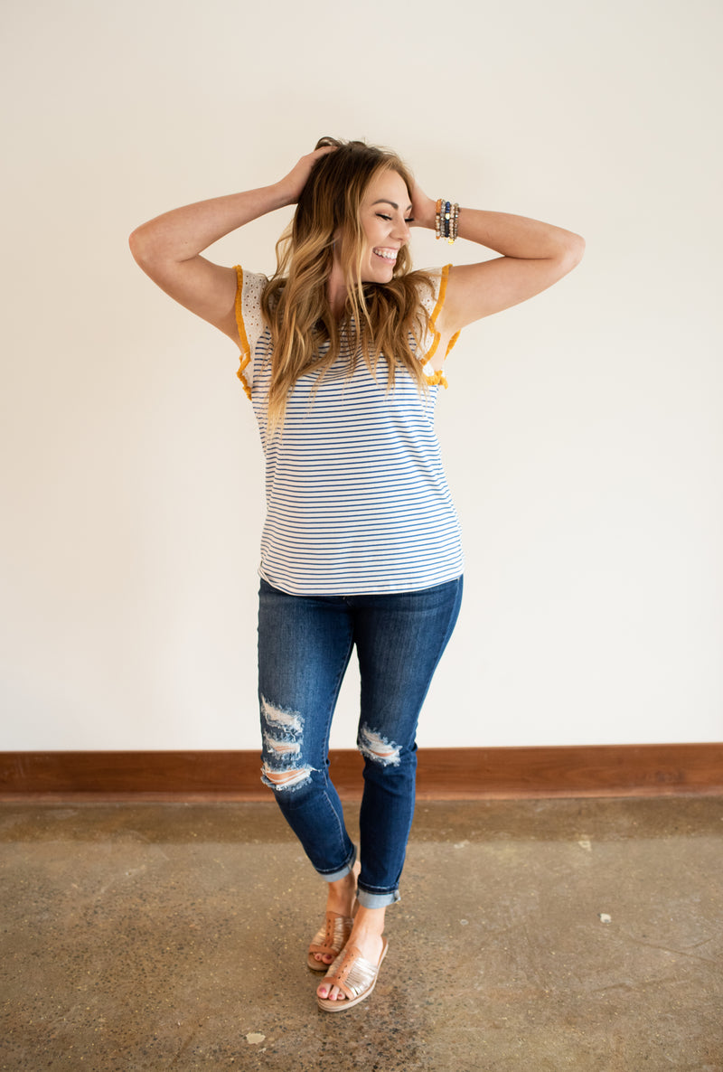 High Rise Skinny w/ Distressing