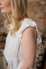Peplum Ruffle S/S White Top